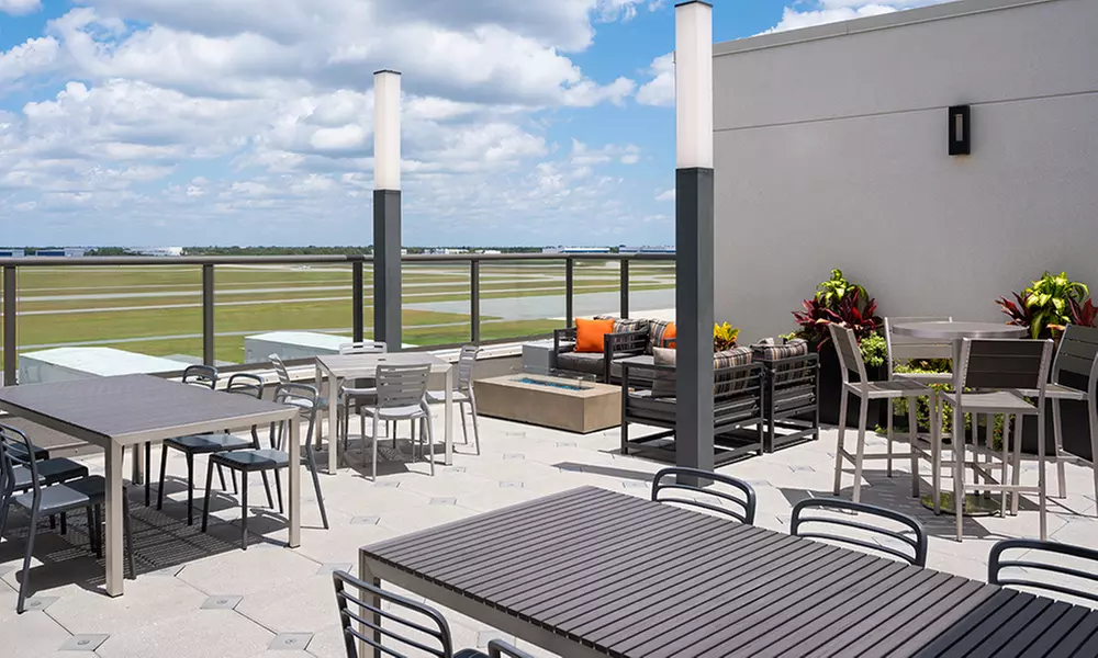 Dining with Runway Views: $50, $75, or $100 Towards Food & Drinks 