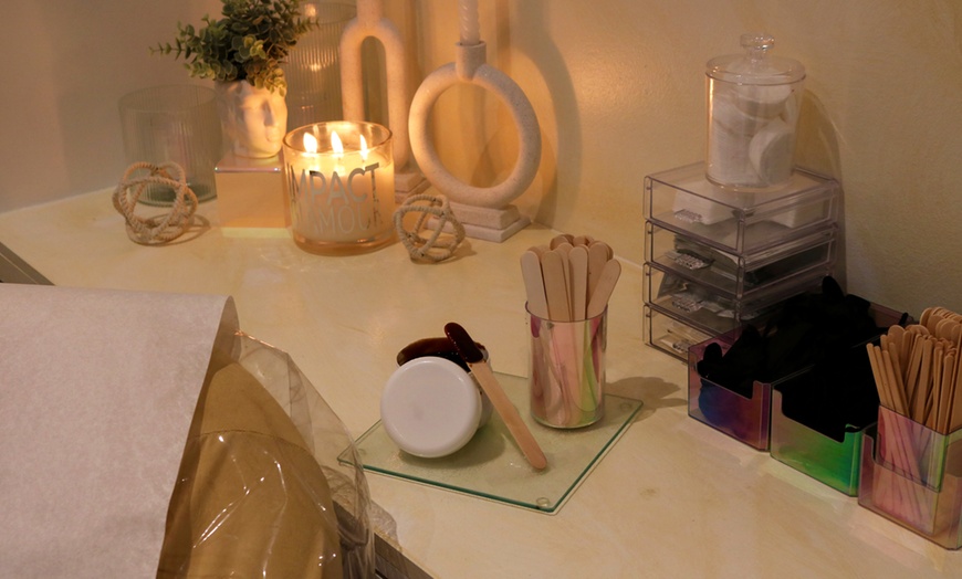 Image 1: Get Smooth Skin with Brazilian Sugaring + Underarm Wax Package