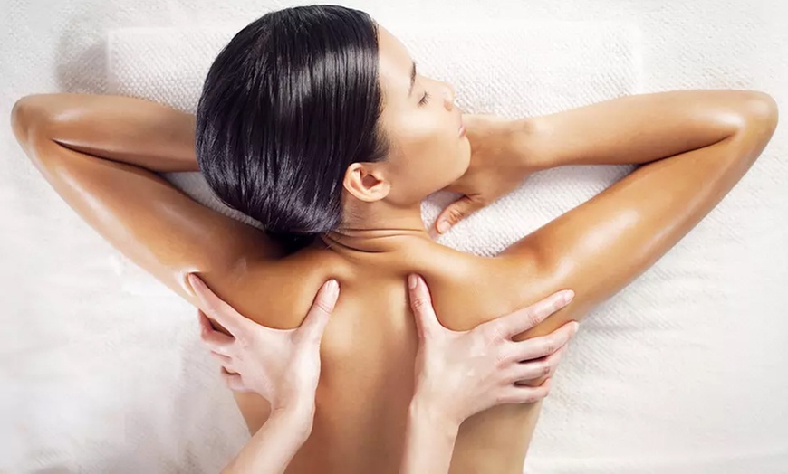 Image 3: Get 60 Mins Swedish Couple's Massage with Hot Stones, Facial & Wine