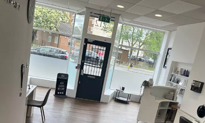 Wash, Cut, and Blow Dry with Optional Olaplex Conditioning Treatment