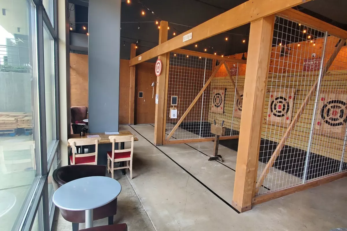 Experience the Thrill of Axe Throwing: Expert Coaches, Bullseye Hits, and Friendly Competition  - Second Medium