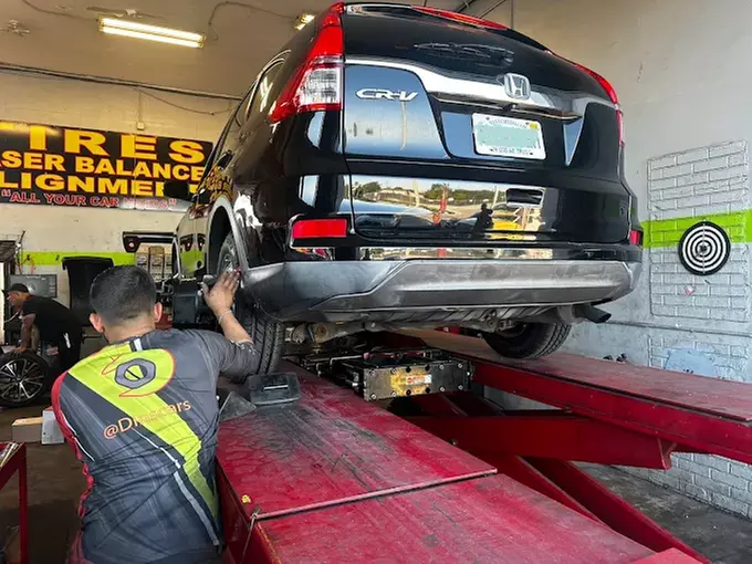 Four-Tire Wheel Alignment with Optional Tire Balancing