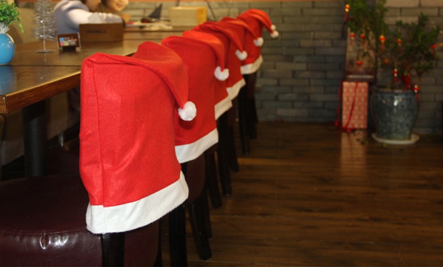 Image 3: Get Festive Four-Piece or Non-woven Christmas Chair Cover Set x4/x8