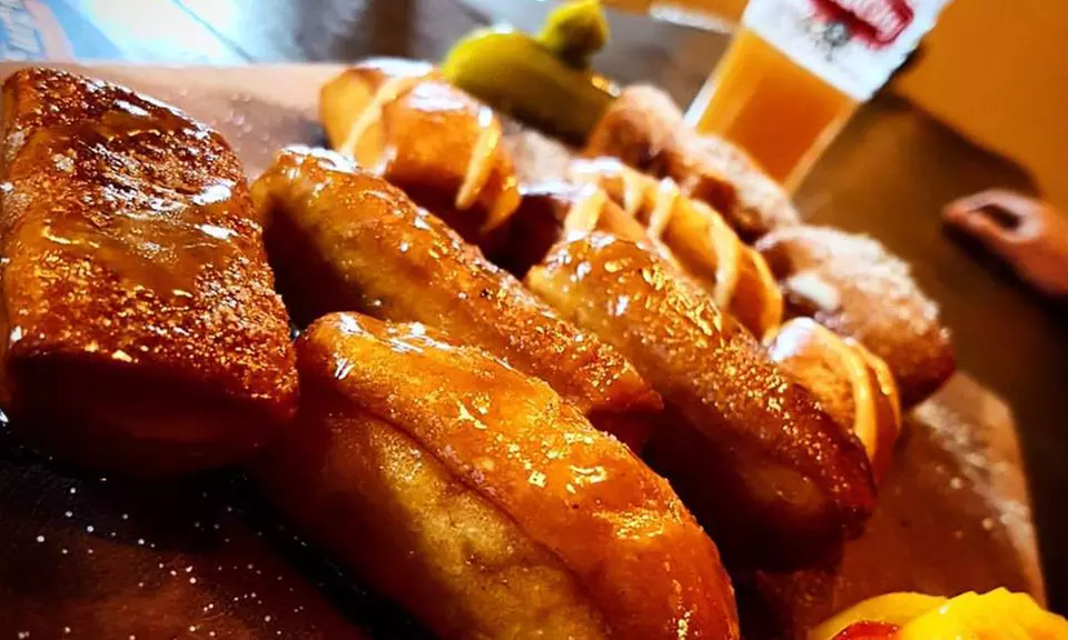 Tasting Flight for Two or Four with $10 or $20 Food Credit at Bell City Brewing (Up to 43% Off) - Primary Image