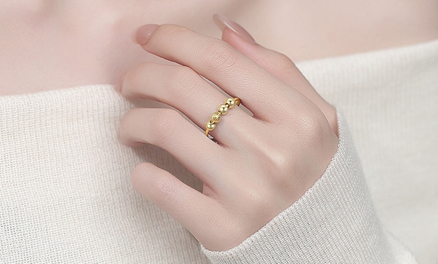 Image 9: 2x Elegante Spinner-Ringe mit drehbaren Perlen zur Entspannung