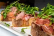 Enjoy $50 or $100 Dining Credit Toward Food and Drinks at Chef  Roma Kitchen - Second Medium