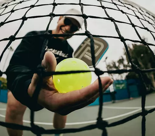 Enjoy Unlimited Weekday Pickleball Fun with Free Paddle Rental!