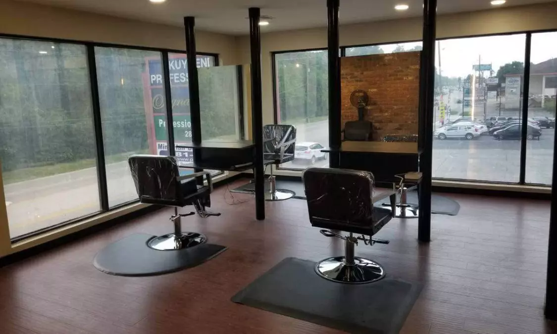 One Women's Haircut, Shampoo, Conditioning, Blow-Dry, Style and More