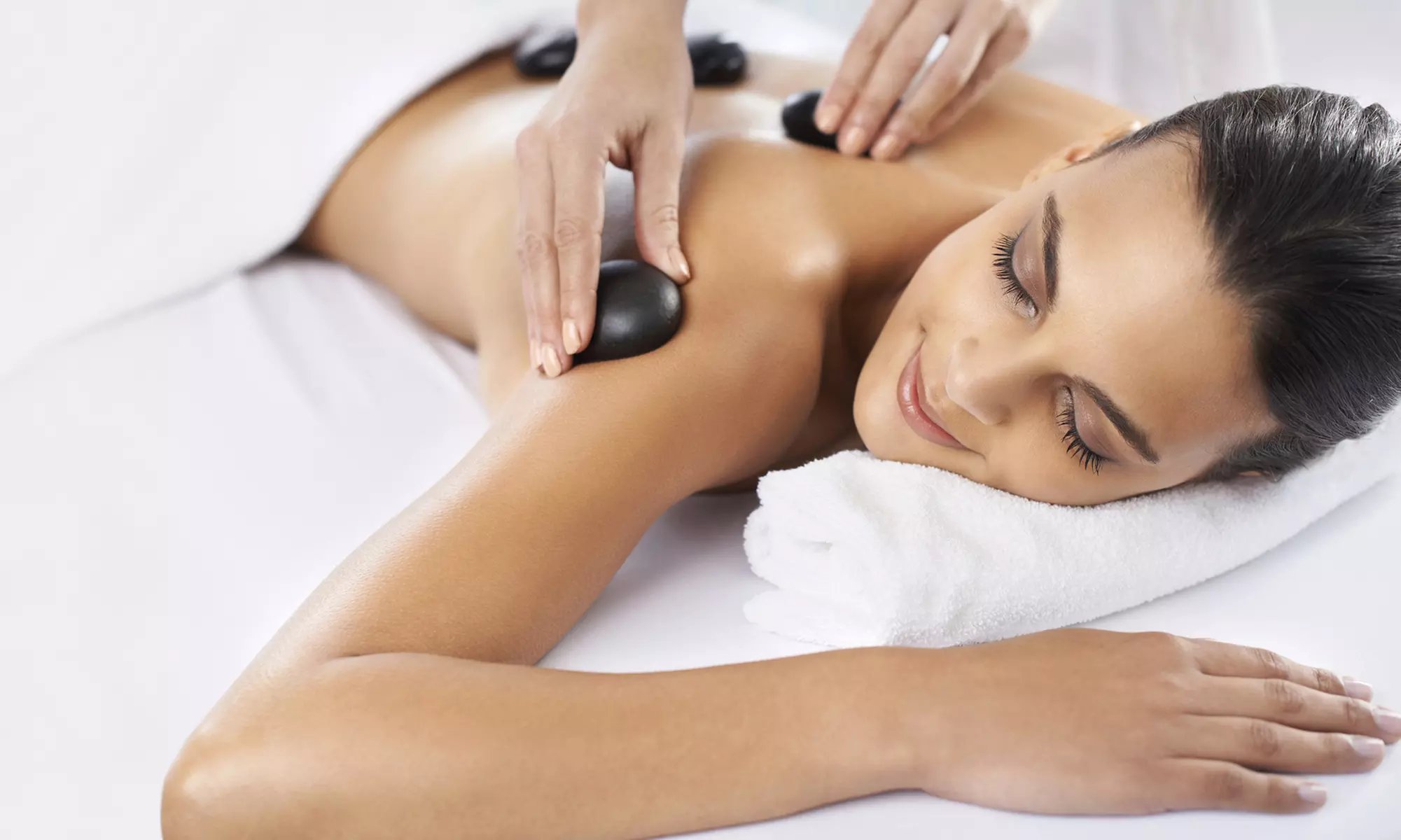 Relax and Rejuvenate with 60, 75, or 90-Minute Swedish Massage and Hot Stone at The Well Day Spa (Up to 36% Off) - Primary Image
