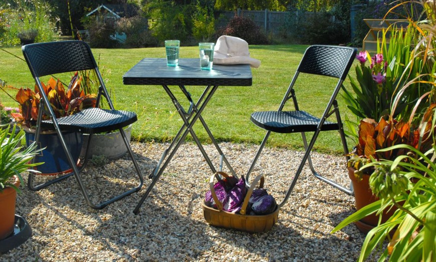 Image 10: Foldable Plastic Table and Chair Set Collection
