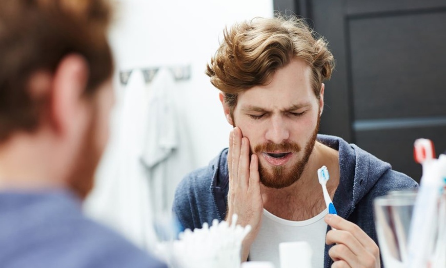Image 1: Get Quick Relief: One Emergency Dental Exam, X-Rays & Tooth Extraction