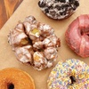 Image 25: Up to a Dozen Donuts, 4 Donuts & 2 Drinks or $50 to Spend
