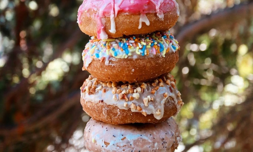 Image 12: Up to a Dozen Donuts, 4 Donuts & 2 Drinks or $50 to Spend