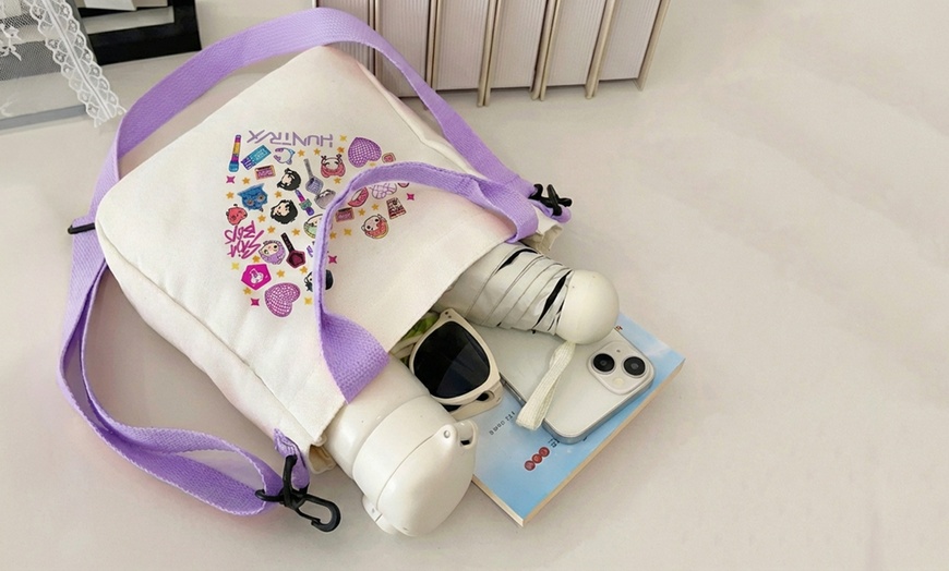 Image 7: Lightweight Purple Canvas Bag with Playful Design