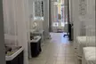 75-Min Head Spa for 1 or 2 w/Massage on Shoulders + Mini-Facial & Scalp Analysis (Up to 32% Off) at Touch Beauty - Second Medium