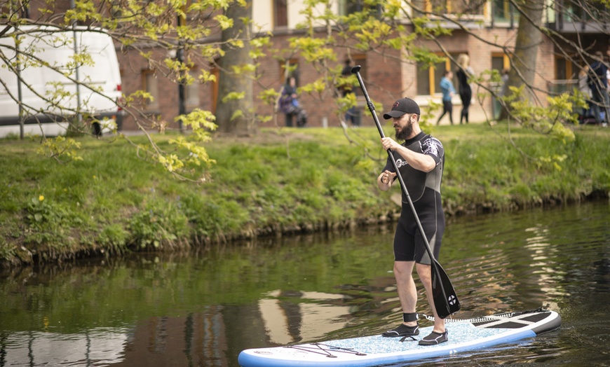 Image 1: Ride the Waves of Fun: Paddleboarding Adventures Await! 