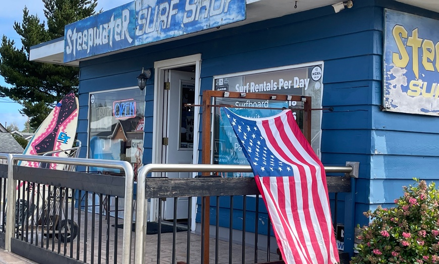 Image 2: Experience a Full Day Surf Equipment Rental for Three or Four 
