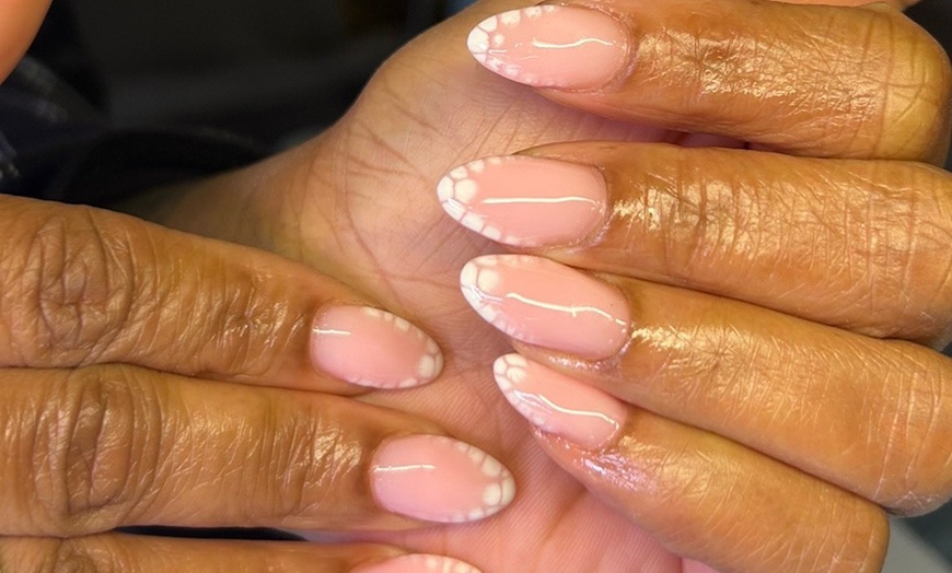 Image 1: Get Polished with Russian Manicure or Deluxe Treatment 