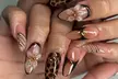 Up to 50% Off on Nail Salon - Mani-Pedi at Fancy hair & nail salon - Second Medium