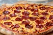 Enjoy $25, $50,/ $100 Food & Drink or One or Two Pizza with Toppings (Up to 39% Off) - Second Medium