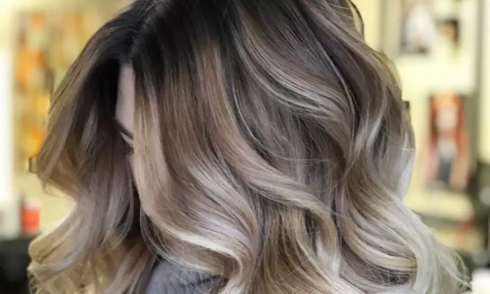 Get a Fresh Look: Ladies' or Men's Haircut with Optional Deep Conditioner and Blow-Dry Style (Up to 50% Off) - Primary Image