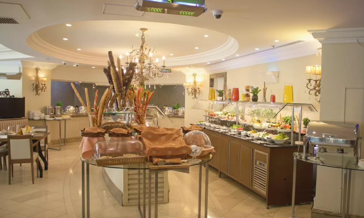 Savor 4* Buffet Lunch Or Dinner for a Kid, or One, Two, or Four Adults