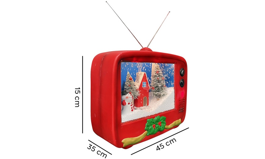 Image 4: Decoración navideña con forma de TV, con luces, música y movimiento