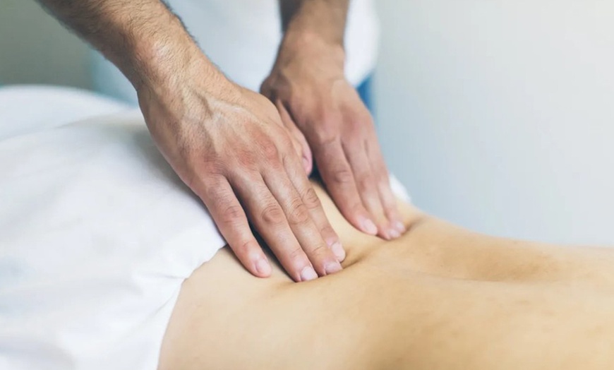Image 2: 60-Min Therapeutic Sports Massage + Hot towels & More