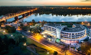 Toruń: pokój deluxe ze śniadaniem, basenem i więcej Toruń: pokój deluxe ze śniadaniem, basenem i więcej