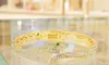 BDS Treasures Gold-Plated Snake Bangle, Bold Brass Statement with Symbolic Style