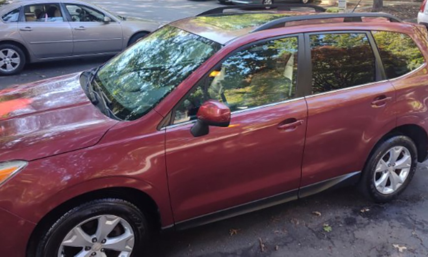 Image 4: Signature, Premium, VIP Full Interior, or Deluxe Full Mobile Detail