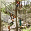 Image 1: Adventure Awaits: Aerial Park Admission for Up to 6 People with Gloves