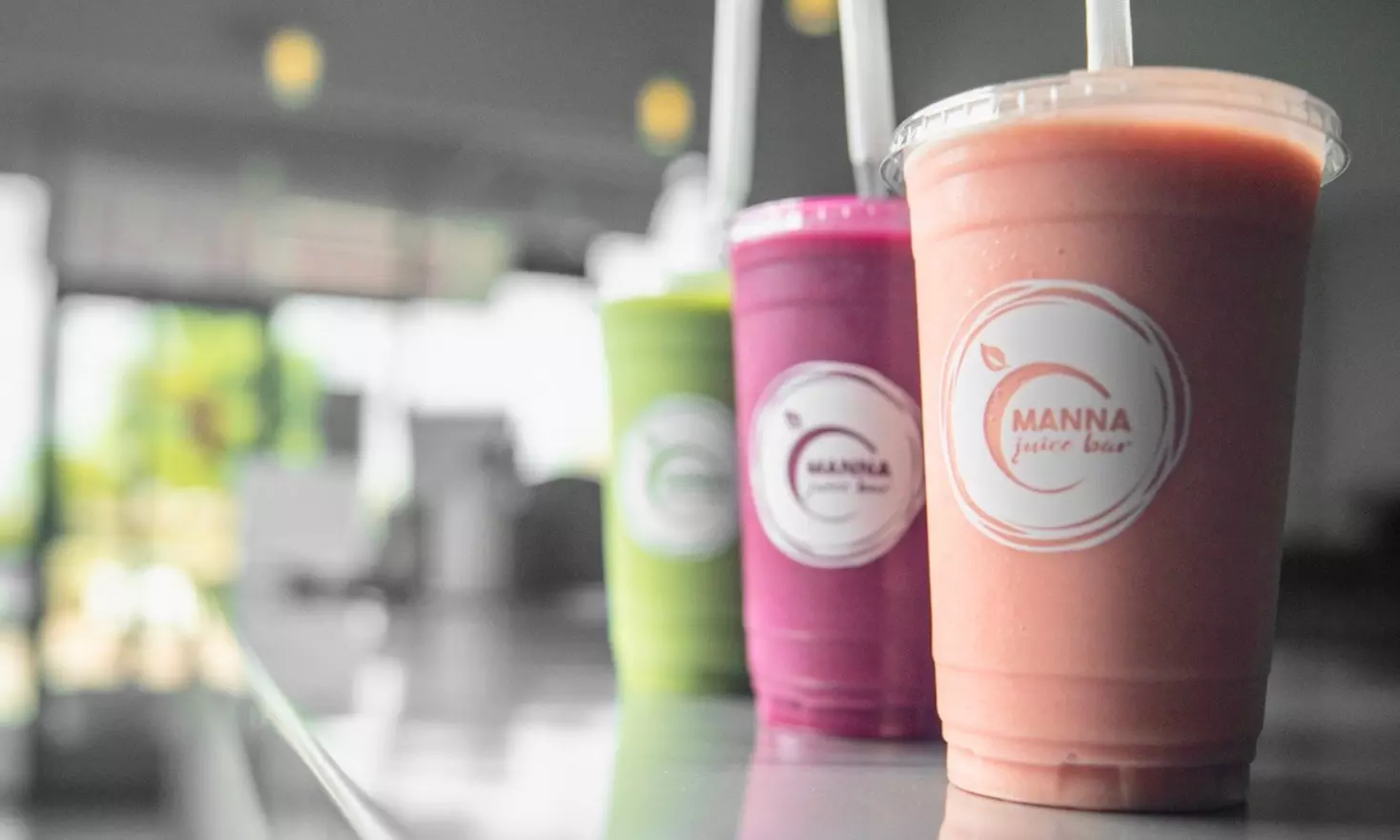 Smoothies, Juices, and More at Manna Juice Bar (Up to 33% Off). Two Options Available. - Primary Image