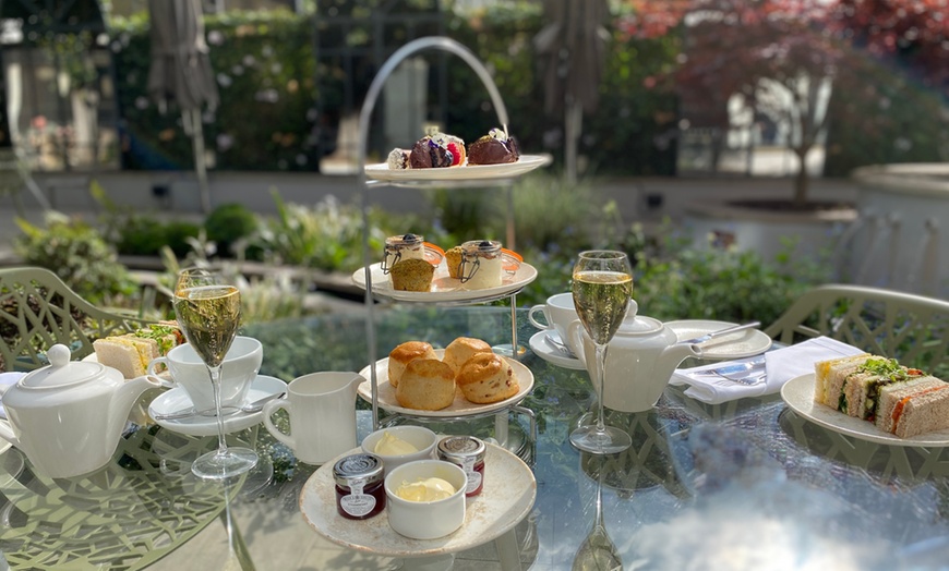 Image 1: Traditional or Sparkling Afternoon Tea for 2 or 4 in a Secret Garden