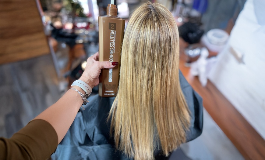 Image 1: Haircut With Condition, Blowdry, Color Retouch, And Deep Treatment