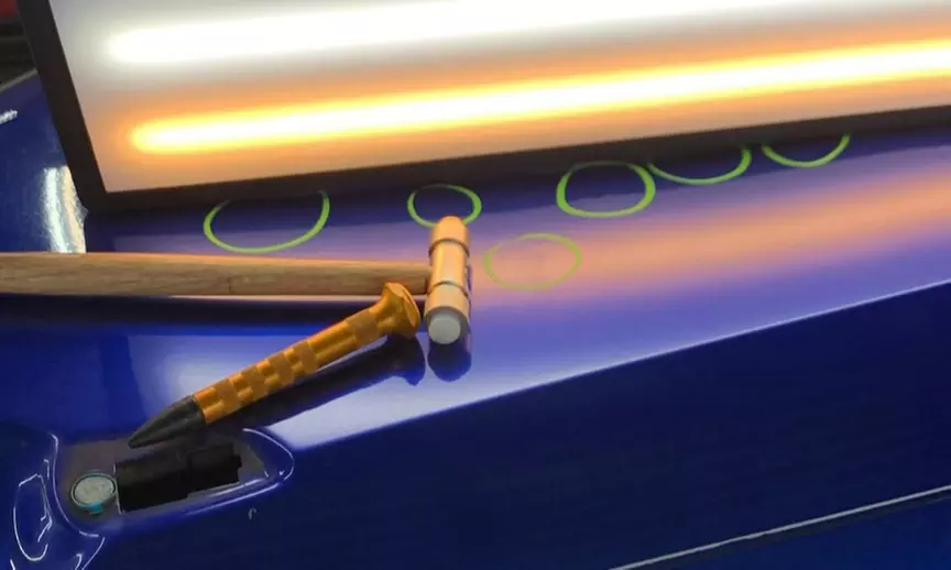 Paintless Dent Repair Credit for Vehicle Dent Restoration