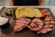 Parrillada para 2 o 4 con aperitivo, entrantes, postres y bebida, opción a botella de vino con hasta 76% menos - Second Medium