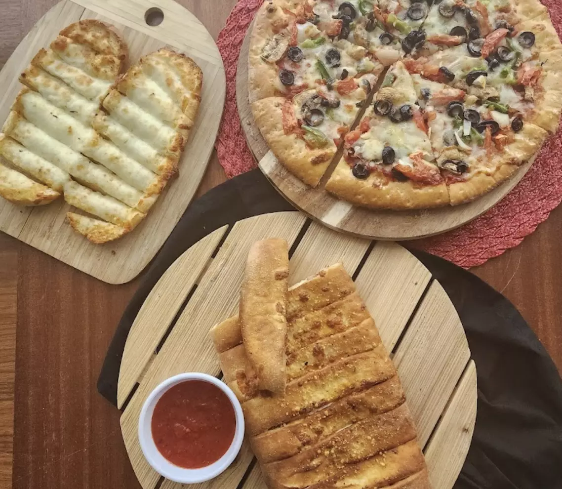 Savor Up to $100 of Flavorful Italian Meals at Pizzanos Express
