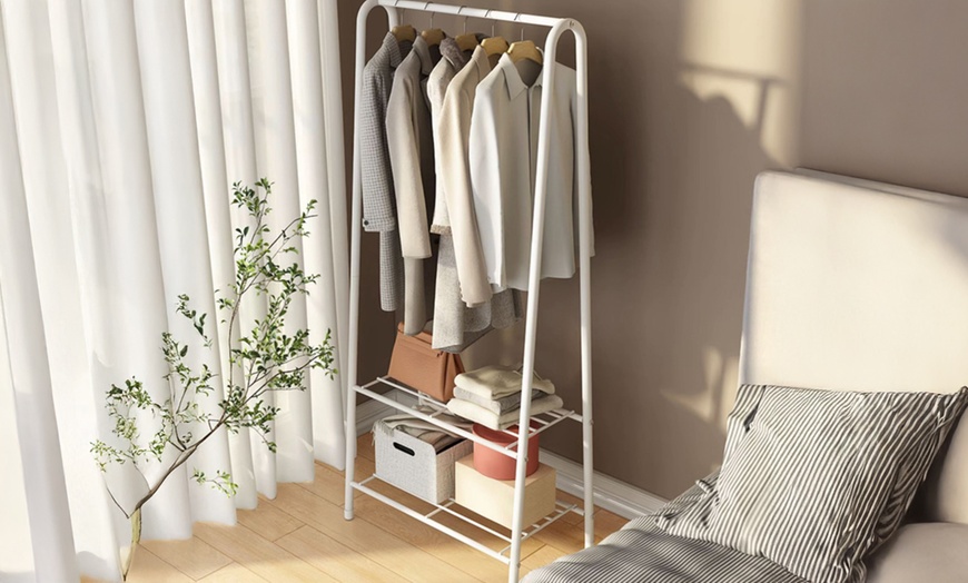 Image 1: Metal Clothes Rack with Hanging Rail and Two Shelves