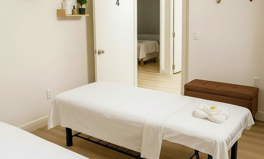 Image 4: 60 or 90-Min Deep Tissue Massage w/ Warm Oil, Hot Towels & Hot Stones