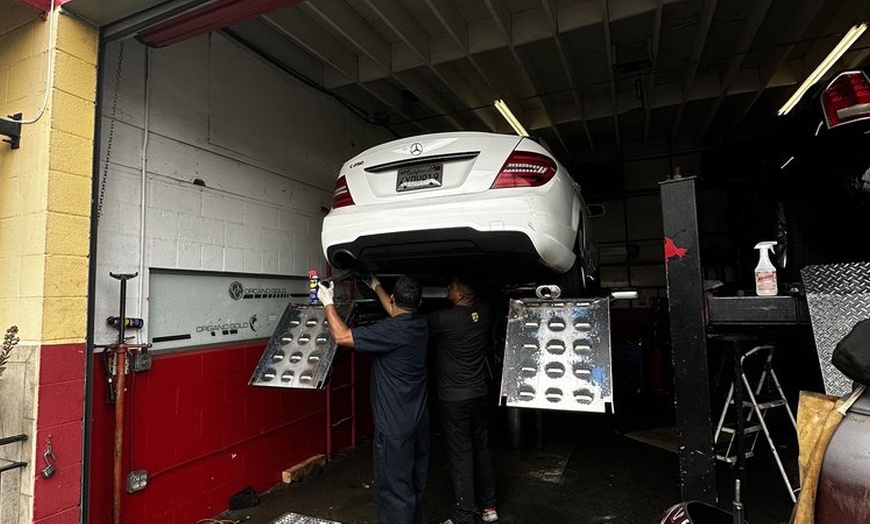 Image 1: 1 or 2 Full Synthetic Oil & Filter Change Plus Multi-point Inspection 