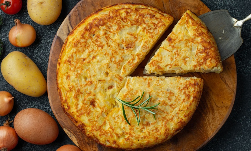 Image 1: Explore Authentic Spanish Cuisine and Traditional Cooking Techniques