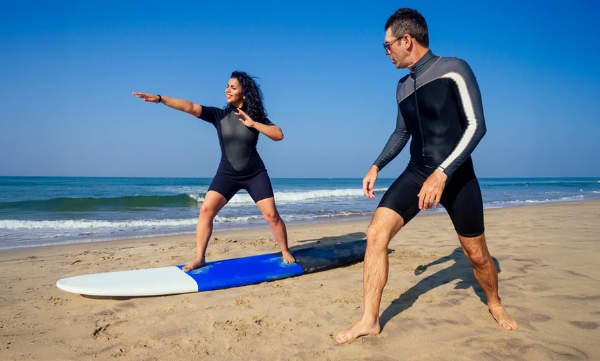 Image 1: Surfing Lesson w/ Go-Pro Video Package for One, Two, or Four