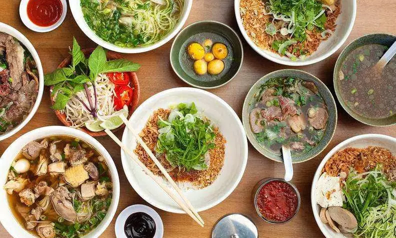 Food and Drink at Pho Banh Mi Cafe, Takeout and Dine-In (When Available) (Up to 30% Off). Two Options Available. - Primary Image