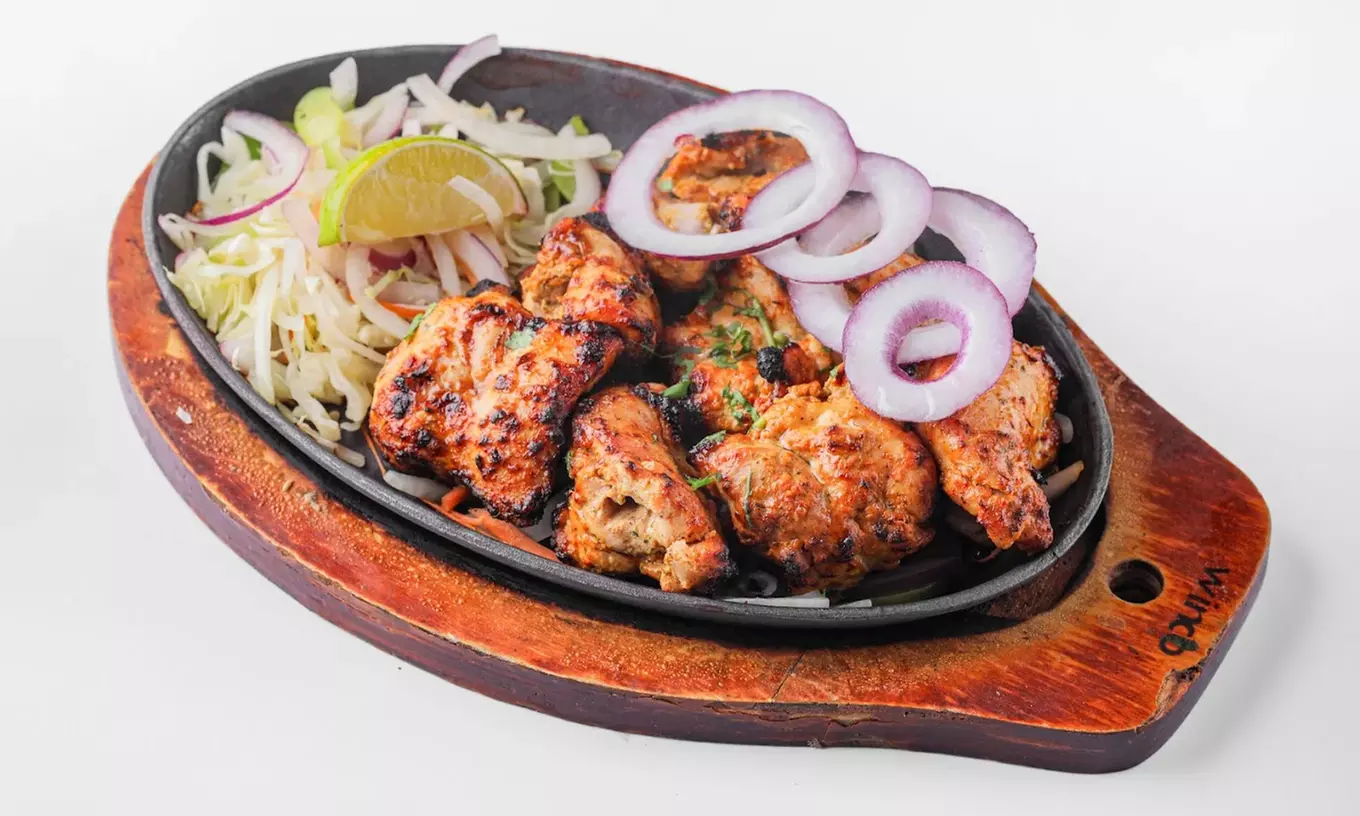 Authentic Indian Cuisine for Two, Four Person or Dining Credit