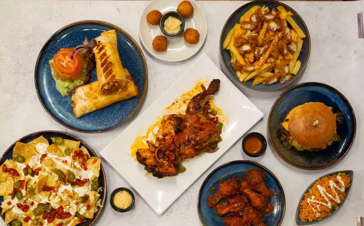 Indulge in Bold Flavors: Starter, Main, & Drink for Up to Four People