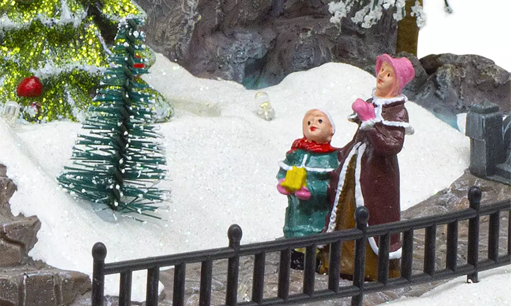 Adorno navideño "Aldea de Navidad" con luces de colores y melodía