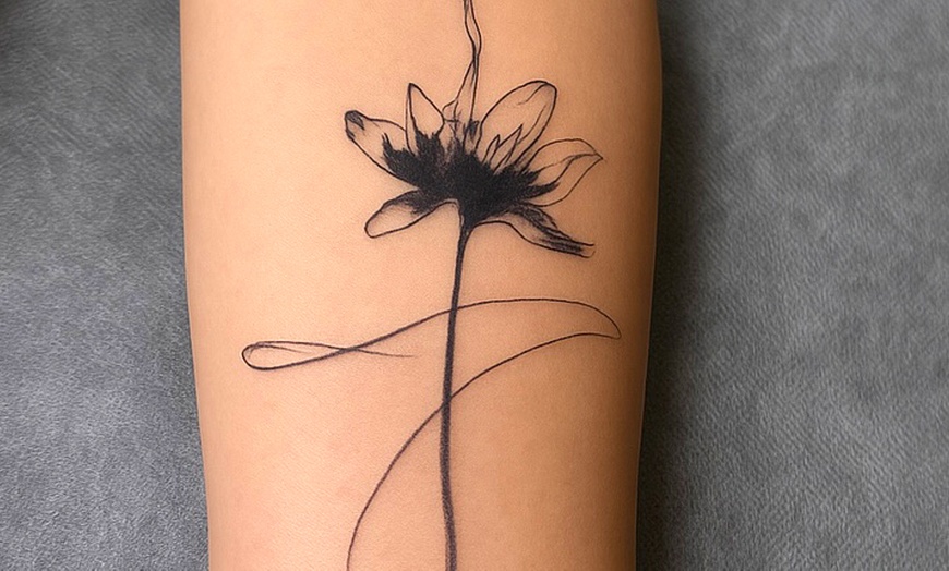 Image 1: Transform with a Small or Medium Fine Line Tattoo Design