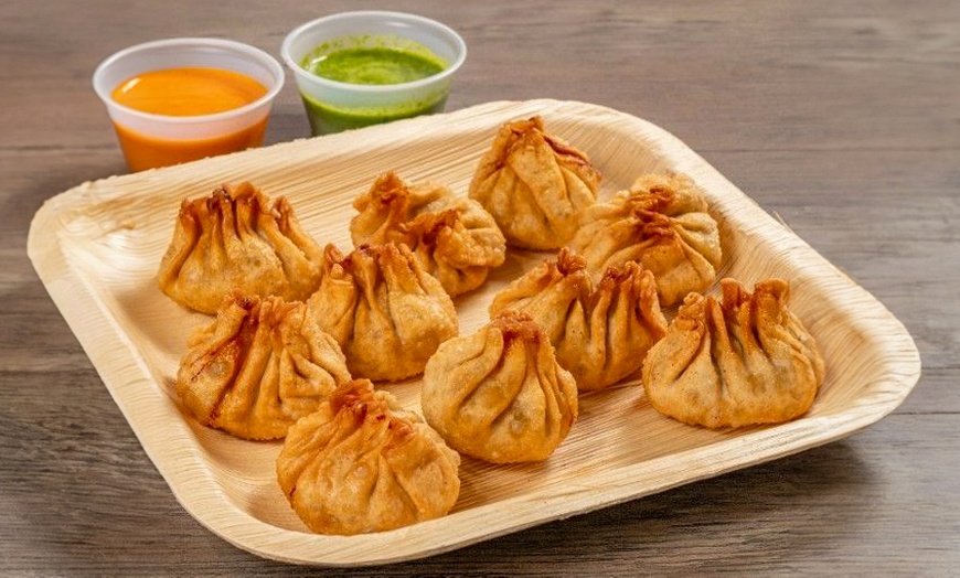 Image 3: Dumpling Feast with Spring Rolls or Buns and Drinks for 2 or 4 People
