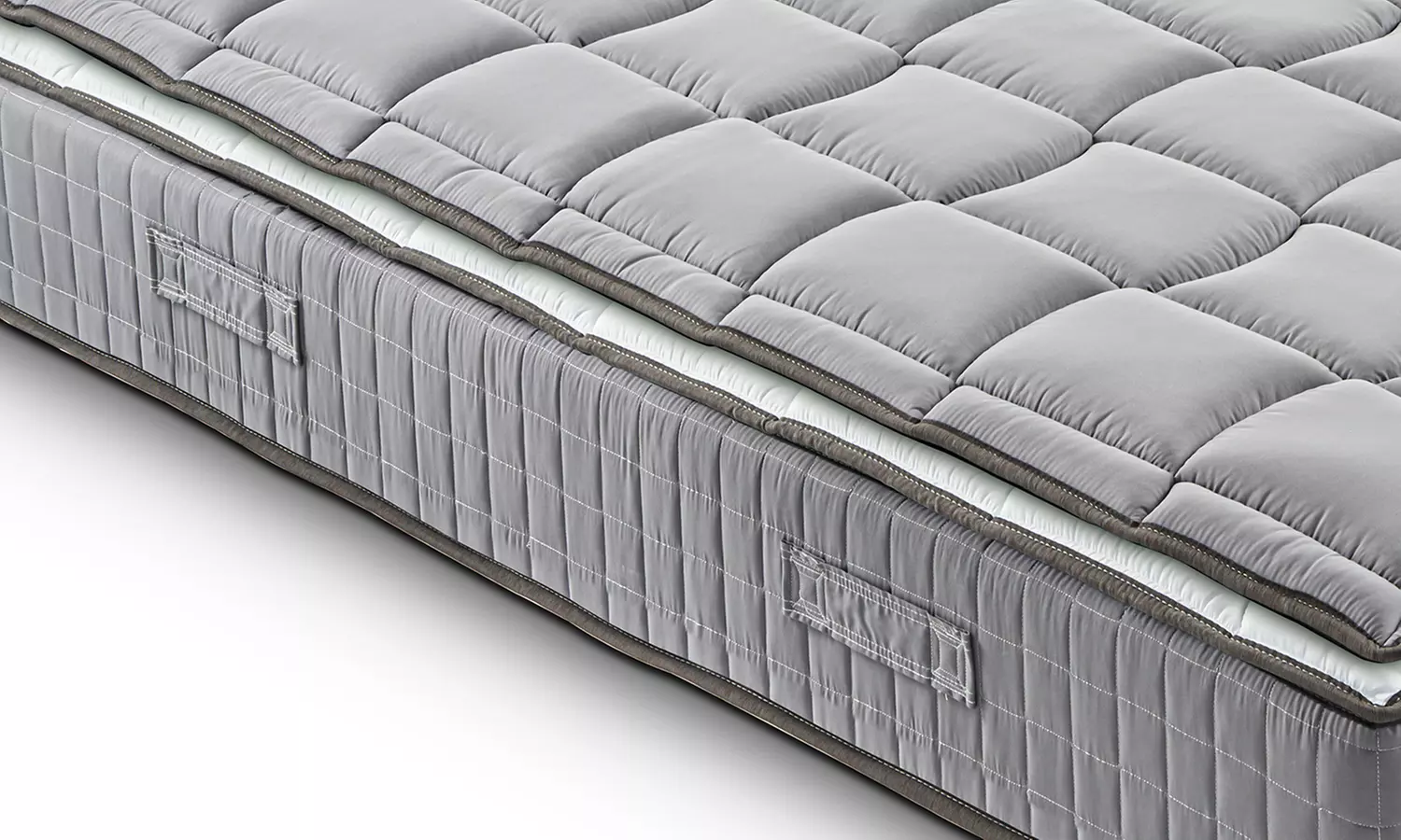 Orthopedische springverenmatras met afneembare topper van traagschuim